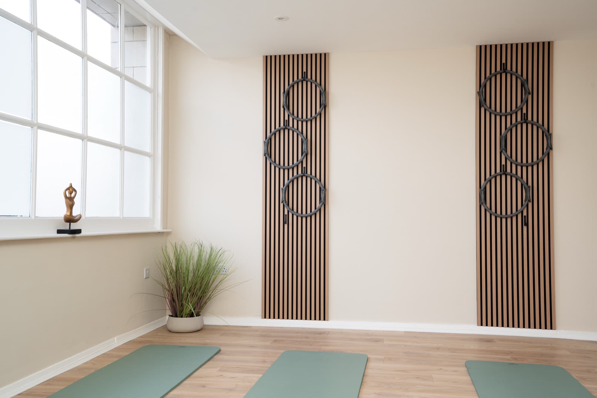 Matwork studio with magic-circle wall display