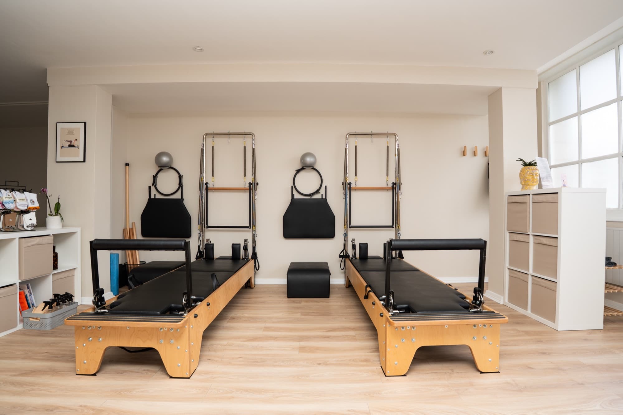 Two reformers ready in the Parkstone Pilates studio